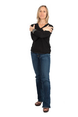 Fototapeta premium Beautiful woman doing different expressions in different sets of clothes: full length arms crossed