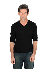Obraz premium Handsome man doing different expressions in different sets of clothes: love