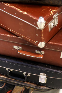 Old Suitcases on end