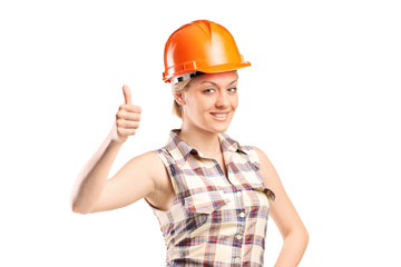 Female construction worker giving thumb up