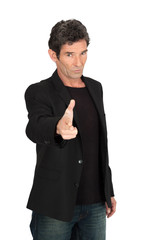 Handsome man doing different expressions in different sets of clothes: gun sign