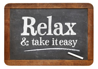 Relax and take it easy - advice on blackboard - obrazy, fototapety, plakaty