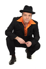 Handsome man doing different expressions in different sets of clothes: posing