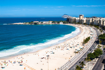 Fototapeta na wymiar Copacabana beach with city skyline of Rio de Janeiro, Brazil.