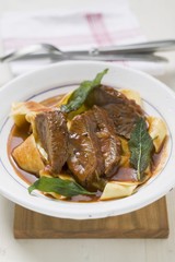 Veal ragout with fried sage and tagliatelle
