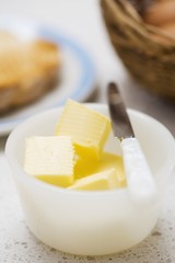 Pieces of butter in a dish