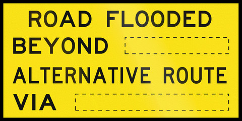 An Australian temporary road sign - Road flooded, alternative road - with copy space