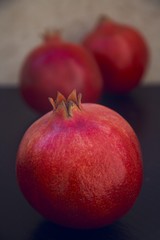 Three pomegranates