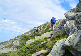 Tourists Climbing Up in Mountain
