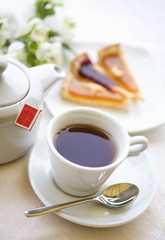 Black tea with pieces of cake