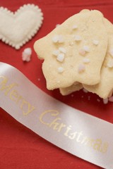 Bell-shaped shortbread biscuits with pearl sugar (Christmas)