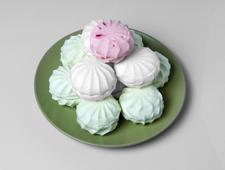 Marshmallow in a green plate