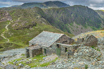 Fototapeta na wymiar Mountain Bothy providing shelter for walkers in Dubs Quarry, Lake District National Park, Cumbria, England.