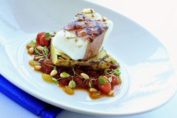 Fried sablefish, grilled potato and tomato ragout
