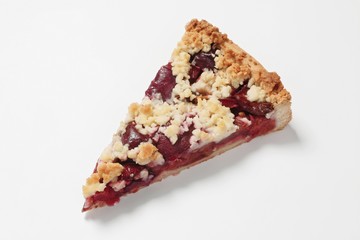 Piece of plum crumble tart