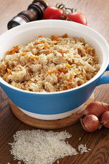 Rice cooked with vegetables and spices in ceramic form