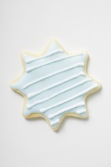 A star biscuit with blue and white icing