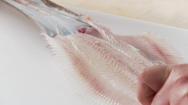 Sole being prepared - removing the skin