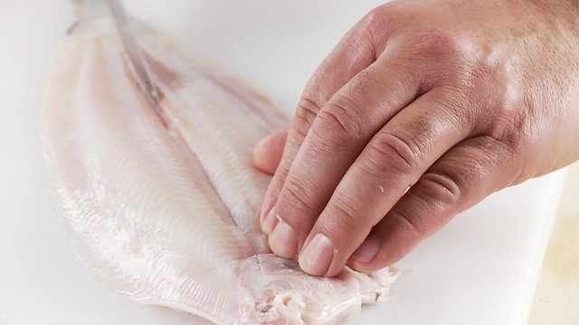 Sole being filleted