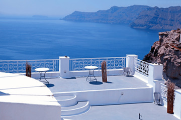 beautiful white terrace overlooking sea in Oia, Santorini, Cycla