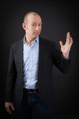 handsome man doing different expressions in different sets of clothes: be careful