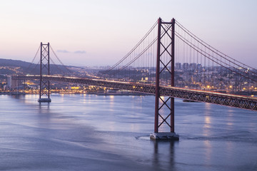 Fototapeta na wymiar Red bridge in Lisbon