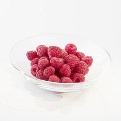 Raspberries in glass dish