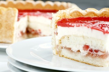 Charlotte Russe with champagne cream, strawberries, raspberry glaze