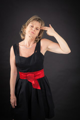 Beautiful woman doing different expressions in different sets of clothes: suicide