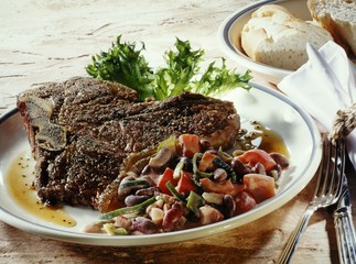 T-bone steak with bean salad
