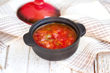 Red borsch. The traditional Ukrainian dish. In a small saucepan