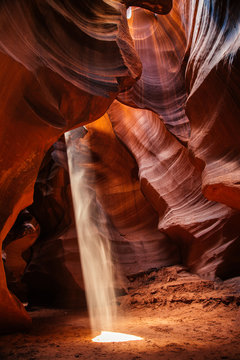 Sunlight spilling into a slot canyon in Arizona