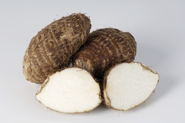 Taro roots, whole and halved