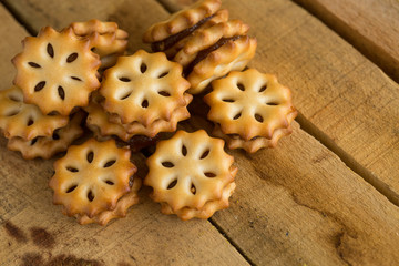 Close up of home made cookies on a wooden table, Sweet cookies on wooden background, 
