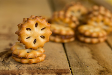 Close up of home made cookies on a wooden table, Sweet cookies on wooden background, 