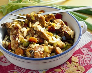 Braised chicken with vegetables, almonds and sherry