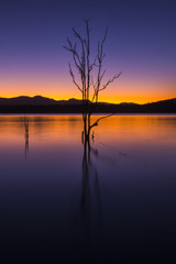 Beautifully rich coloured sunset on a winters evening at Lake Moogerah in Queensland, Australia