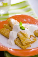 Pancakes with quark filling and cream