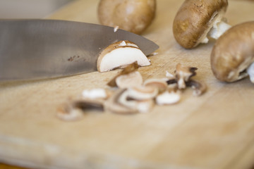Fototapeta na wymiar Chopping Mushrooms