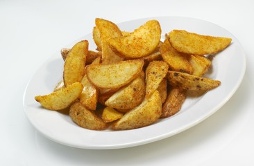 Potato wedges on plate