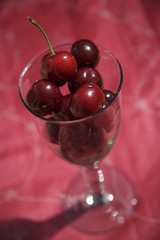 Cherries in a wine glass