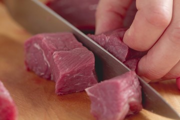 Beef being diced
