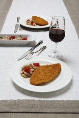 Chicken escalope with a bean medley
