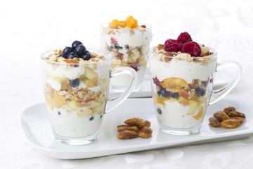 Quark cream with fruit salad and nuts