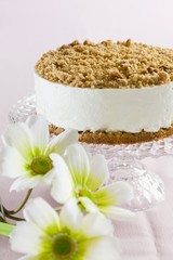 A cream cheese cake topped with crumbles