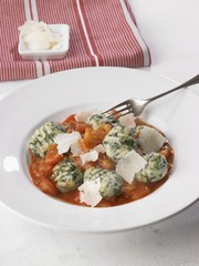 Spinach gnocci with tomato sauce