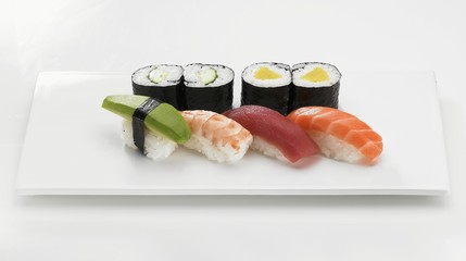 A sushi platter with maki and nigiri