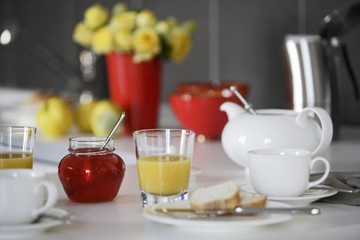 Breakfast with jam, bread and tea