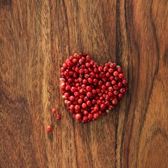 A heart made of pink peppers