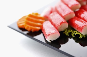 Crab meat with carrots and lettuce leaves